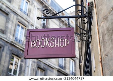 bookshop text vintage signage wooden panel retro bookstore sign in city street