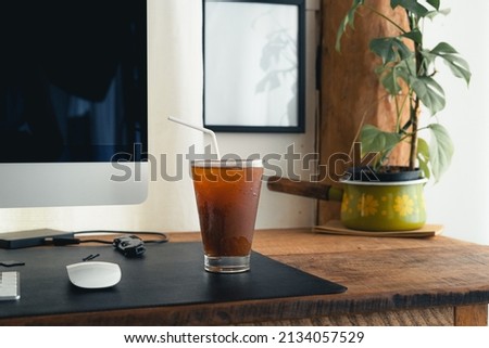 Iced coffee in a cup in the room,iced coffee in a mug at home