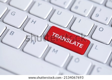 Red key with word translate on white laptop keyboard. The translate button has a text on keyboard Royalty-Free Stock Photo #2134067693