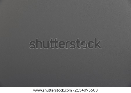 Uniform textural gray background. For use in interiors, construction, finishing repairs. 