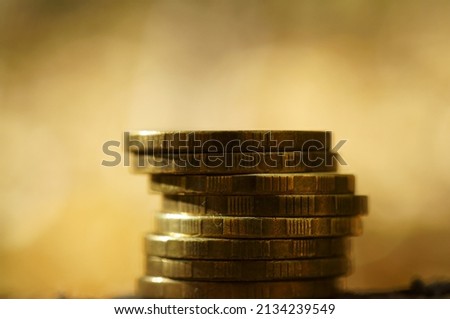 A stack of coins in close-up. Background image. Economics and finance.