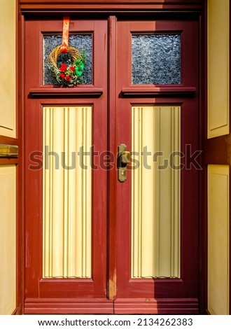 old wooden door at a historic building - photo