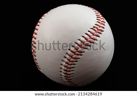 American sports, active hobbies and US culture concept with white leather baseball ball isolated on black background with clipping path cutout