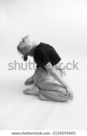The girl does stretching and exercises