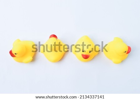 Toy ducks heading with different directions. Business innovation, unique and think different concept.