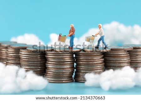 Shoppers on Miniature Creative Cloud Coins