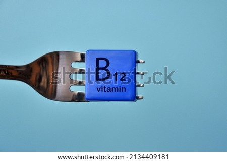 Vitamin B12 on the fork. Food with a high content of vitamin B Royalty-Free Stock Photo #2134409181
