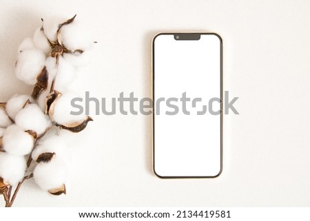 Phone mockup white screen with cotton leaf