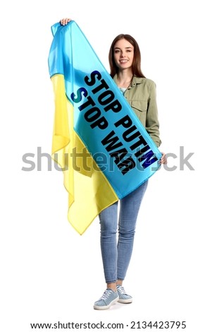 Young woman holding Ukrainian flag with text STOP PUTIN STOP WAR on white background 