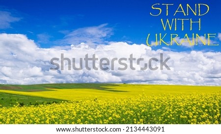 Demonstrator  "Stand with Ukraine".Ukraine, sunflowers are a symbol of Ukraine.