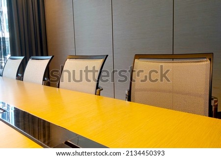 Modern office for negotiations with a large table and chairs