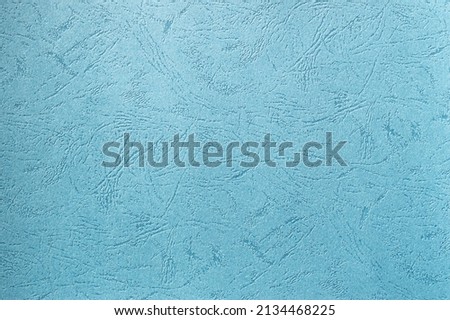 Texture of blue paper with embossing imitating the leather. High quality photo