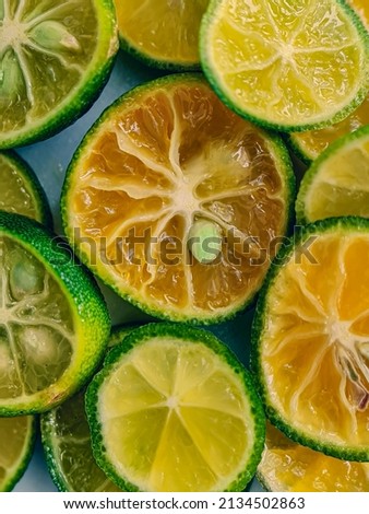 Slices of calamansi lime close up