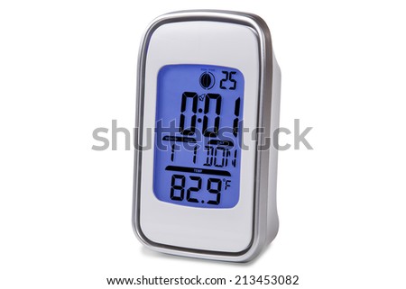 Modern alarm clock isolated en white background.