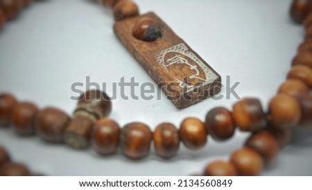 Wooden Tasbih Beads, Islamic prayer beads, prayer beads, on a White Background