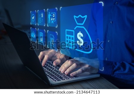 Budget and financial planning concept with accountant working on company's yearly income and expenses forecast on computer. Corporate finance and annual strategic plan. Royalty-Free Stock Photo #2134647113