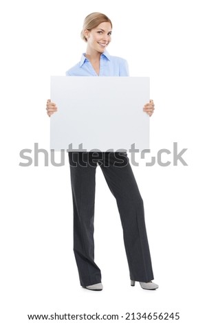 I want everyone to see your brand. Studio shot of a beautiful young businesswoman holding a blank sign against a white background.