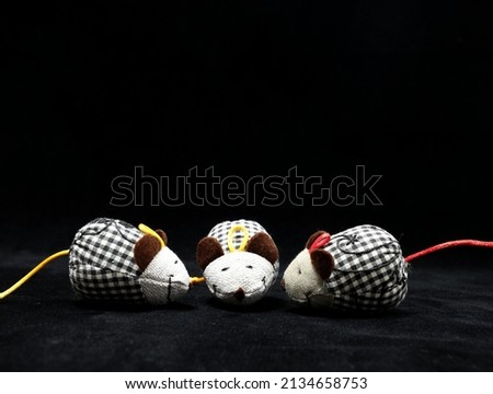Toy Mouse Made of Cotton Cloth on a Black Background