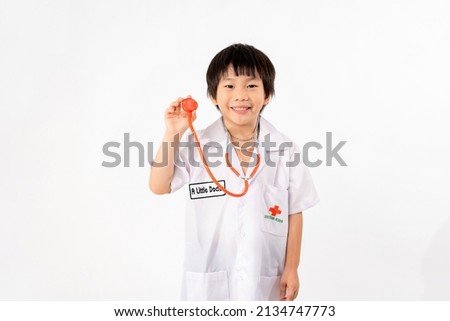 Portrait of Young Asian Boy Dressing to be Doctor Isolate on White Background with Copy space, Education Concept