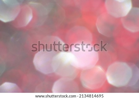 Abstract bokeh background of glittering lights defocused