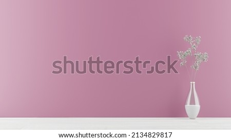 white flowers in vase on pink background