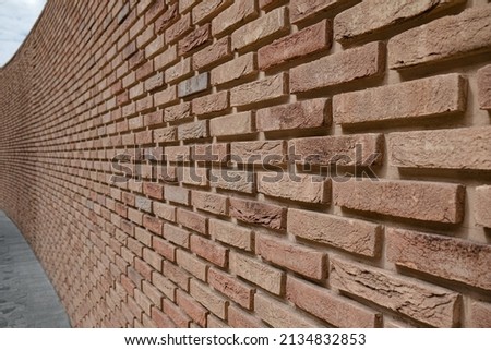 sand color brick wall in perspective