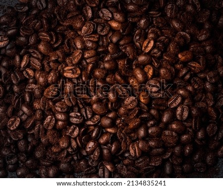 Roasted coffee beans background, close up