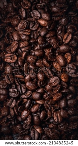 Roasted coffee beans background, close up