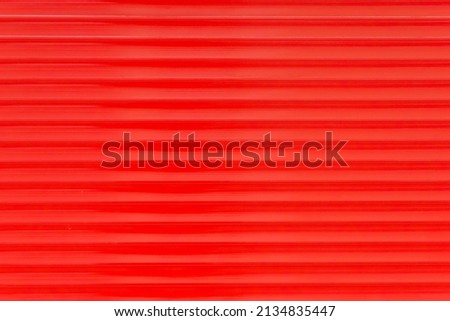 Red Horizontal Plastic Pattern Background Design Stripe Abstract Line Wall Surface.