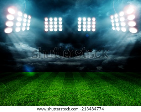 stadium lights at night and stadium Royalty-Free Stock Photo #213484774
