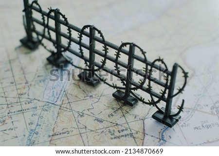Barbed wire on the map of Ukraine. Concept.