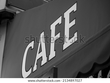 Cafe coffee shop terrace sign on the streets of Paris, France. Place for breakfast. outdoor photography.