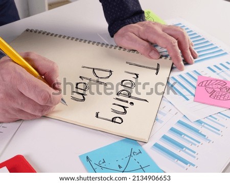 Trading Plan is shown on a photo using the text