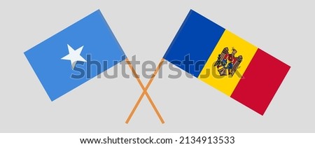 Crossed flags of Somalia and Moldova. Official colors. Correct proportion. Vector illustration
