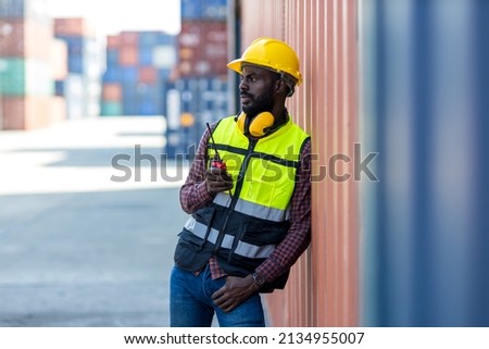 Foreman or worker work at Container cargo site check up goods in container. Foreman or worker checking on shipping containers. Logistics and shipping	
