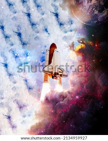 Spaceship flight.Space shuttle launch in the clouds to outer space. Dark space with stars on background.  Elements of this image furnished by NASA