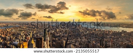 Panorama of  Manhattan at sunset in New York City, NY, USA Royalty-Free Stock Photo #2135055517