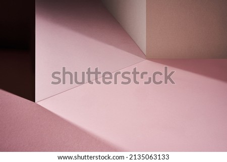 Abstract geometric paper shape pastel pink color paper background