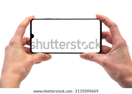 Smartphone held horizontally with blank display as a template for individual customisation