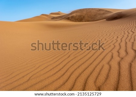 Erg Chebbi, sand desert of Merzouga, southeast of Morocco. Popular destination for travellers. Morocco. Royalty-Free Stock Photo #2135125729