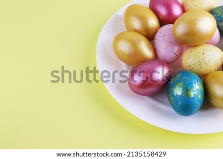 Red Easter eggs on a bright background. Easter background with eggs close up. Place for text.