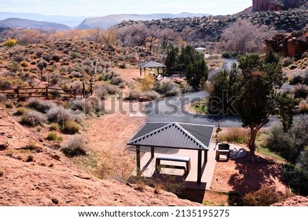 Inviting, shaded picnic tables at Red Cliffs National Conservation Area, Utah are often quiet in the winter season Royalty-Free Stock Photo #2135195275