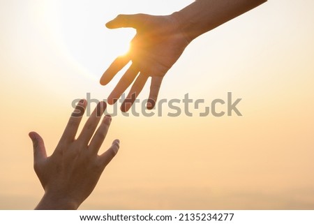 two people holding hands The concept of shaking hands to help the nation make peace Thank you for your support international peace day develop friendship please help me