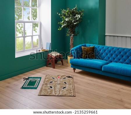 Prayer rug in the room style, living room background. Royalty-Free Stock Photo #2135259661