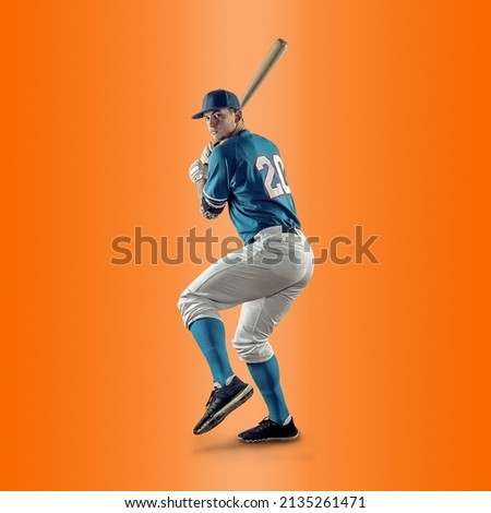 Baseball players in dynamic action in action on gradient multicolored neon background. Concept of sport competition. Royalty-Free Stock Photo #2135261471