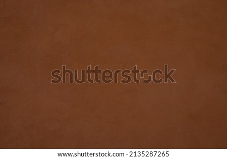 Sandstone texture for background. Surface of the marble with brown tint