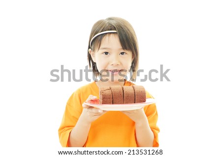 Happy kid holding a sweets