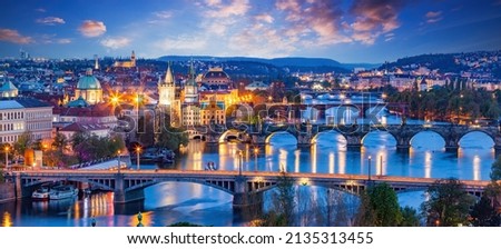 Prague, Czech Republic bridges panorama with Charles Bridge and Vltava river at night Royalty-Free Stock Photo #2135313455