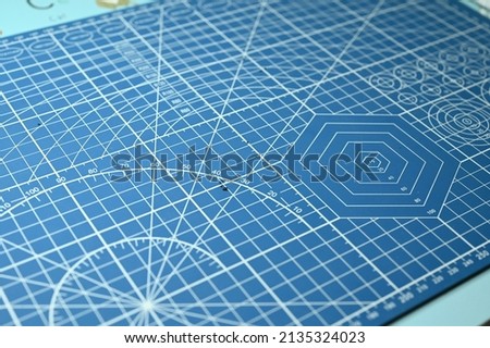 blue cutting mat, equipment in office