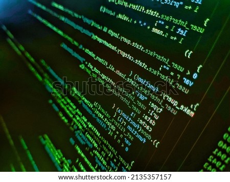 Programmer working on computer screen. Abstract computer script source code. HTML5 in editor for website development. Web programming and bracket technology background